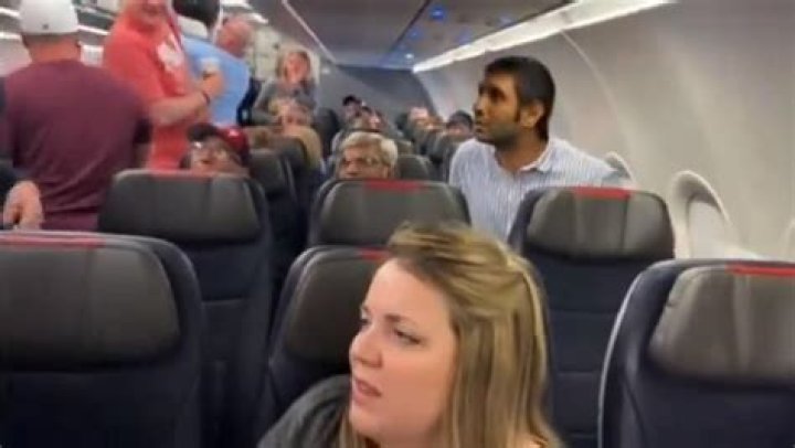 American Airlines passenger put in headlock, forced off plane after
