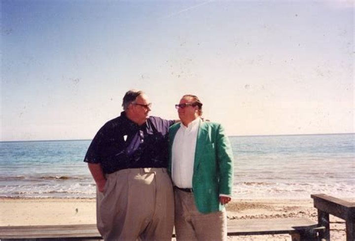 Chris Farley posing with his dad pics