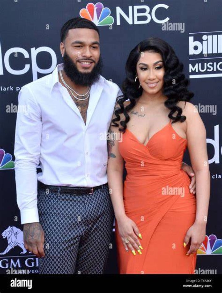 Clarence White & Queen Naija from 2019 Billboard Music Awards Red