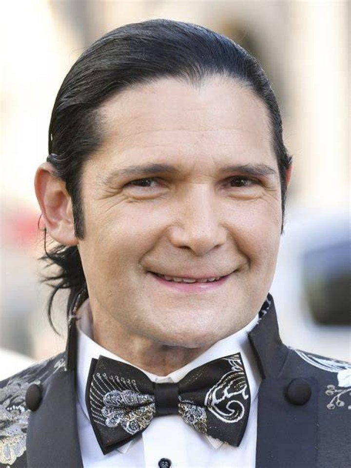 Corey Feldman's model wife towers over him at premiere