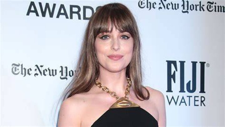 Dakota Johnson Wears Black Bikini With BF Chris Martin & His Son Moses