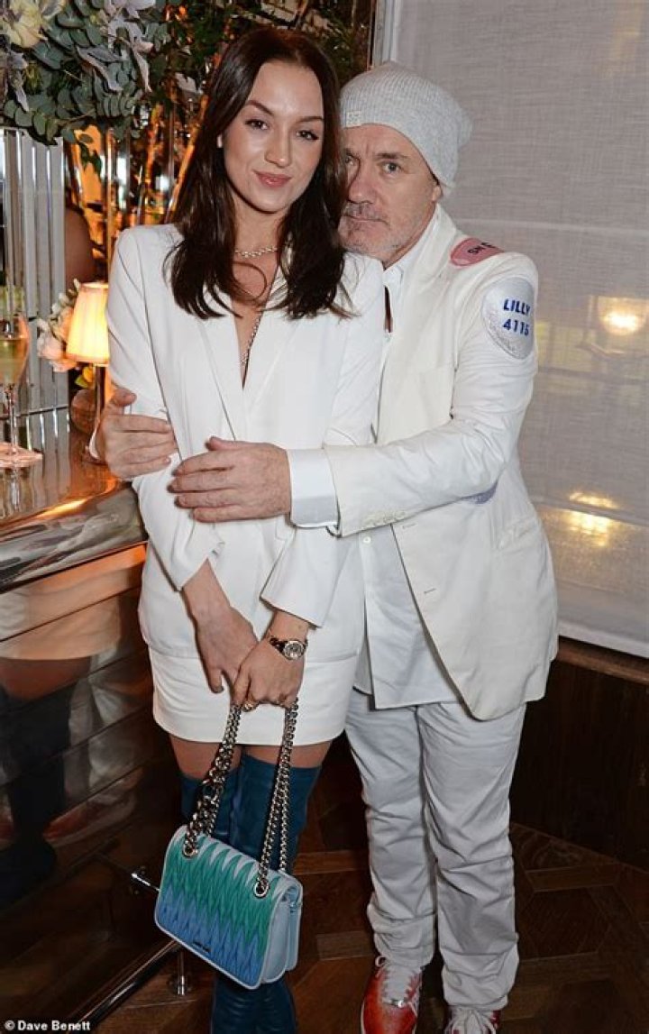 Damien Hirst and girlfriend Katie Keigh attend Star Wars The Force