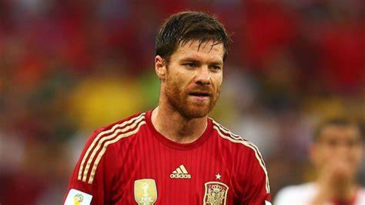 Footballer family man! Xabi Alonso enjoys a day out with his children