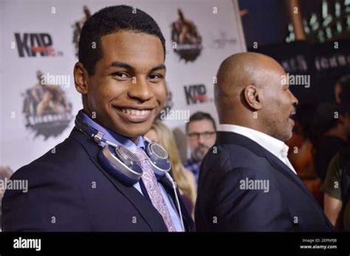 (LR) Miguel Leon Tyson and Dad Mike Tyson arrives at the "Kickboxer