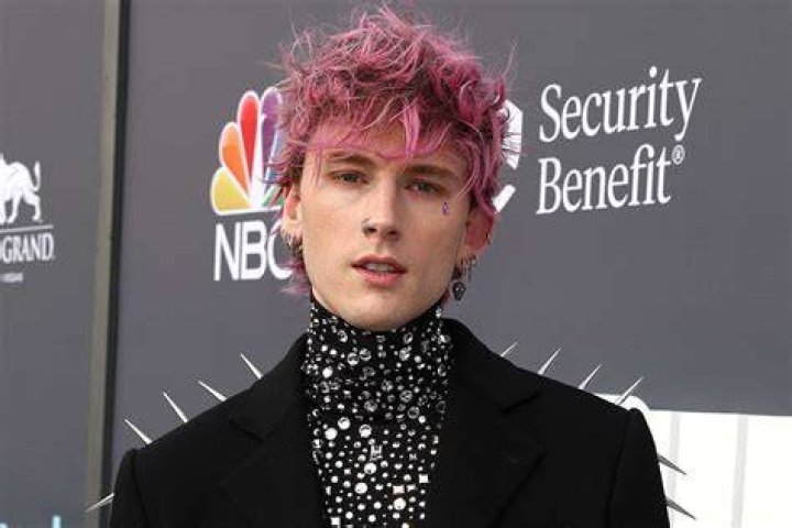 Machine Gun Kelly rocks mask for fashion show with daughter