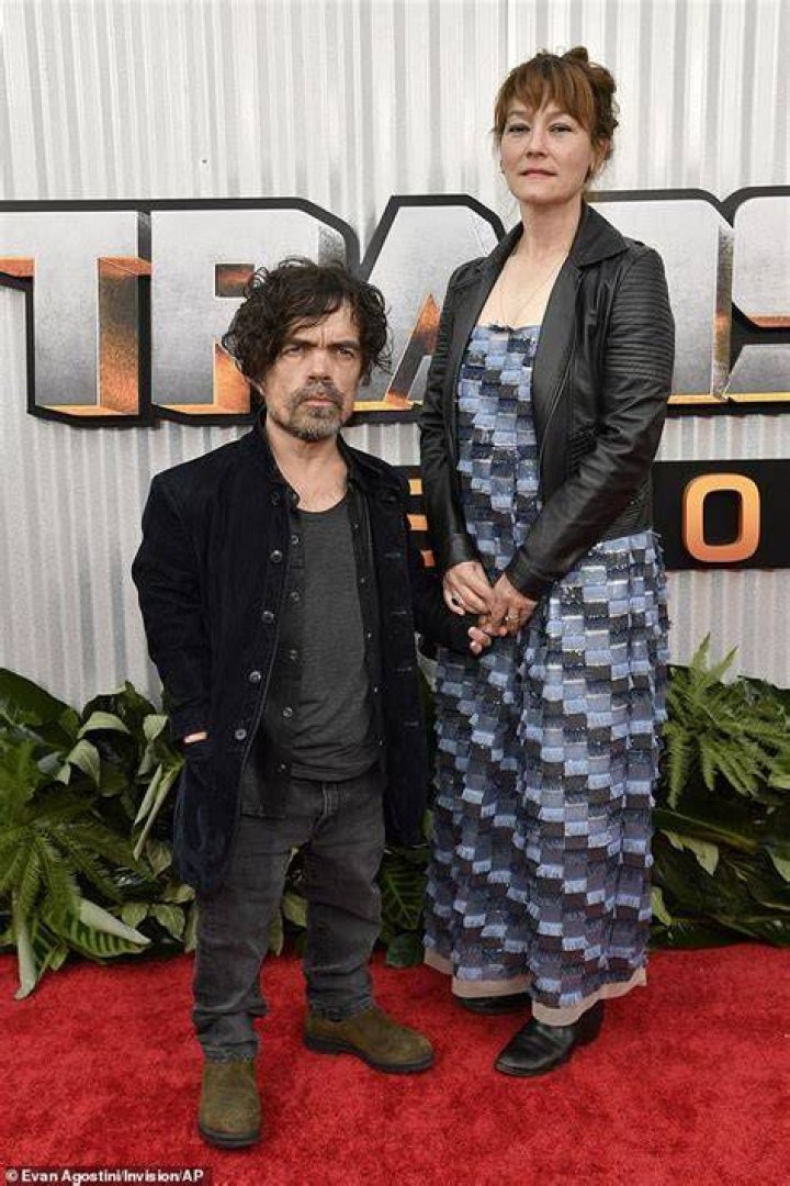 PsBattle Peter Dinklage with his daughter and some earmuffs. r