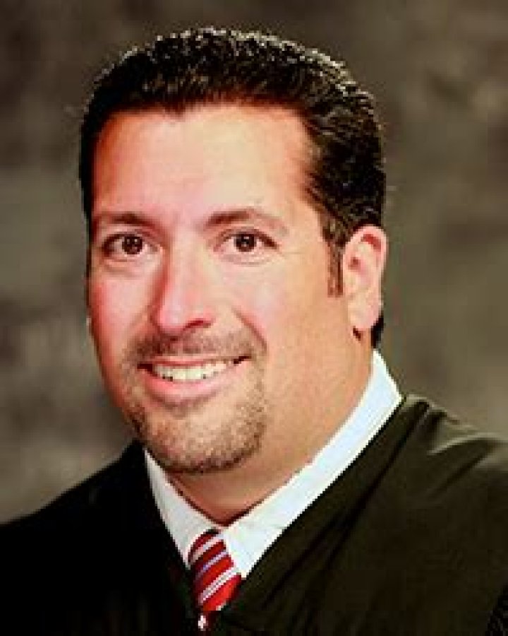 Senior District Judge Joseph Bonaventure talks to a reporter at his Las