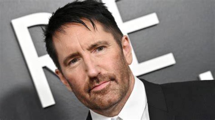 Trent Reznor dotes on his sons during a family day out Trent reznor