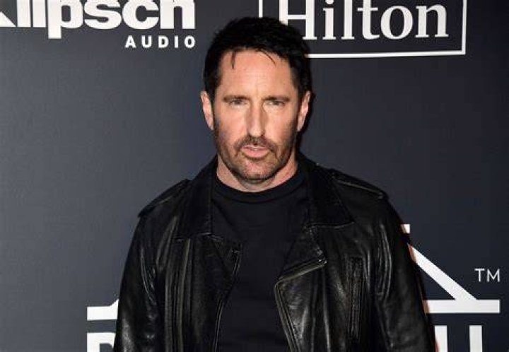 Trent Reznor shows his soft side as he dotes on his sons during family