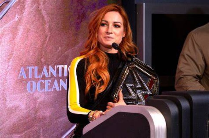 WWE star Becky Lynch announces that she is pregnant in emotional video